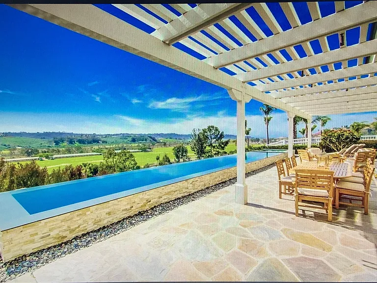 Lap pool with amazing views overlooking polo fields