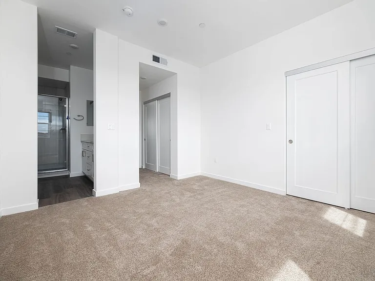 341 E 30th St E — Photo 14