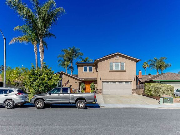 This renovated home offers a newer stucco exterior, newer Milgard windows, insulated garage door, stacked stone exterior wainescotting & much more!