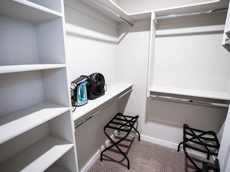 Master bedroom has large walk in closet with plenty of storage and shelves