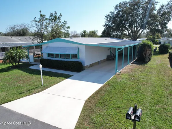 911 Balsam St, Barefoot Bay, FL 32976