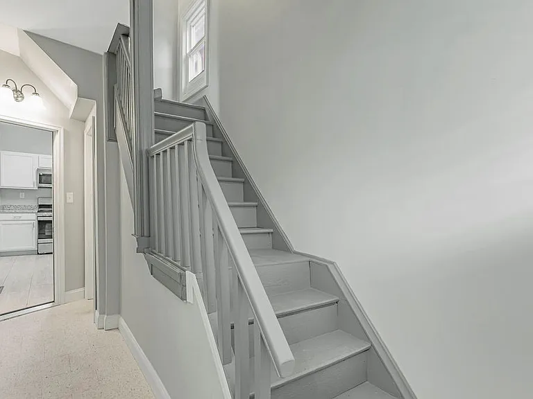 Stairs to the second floor unit