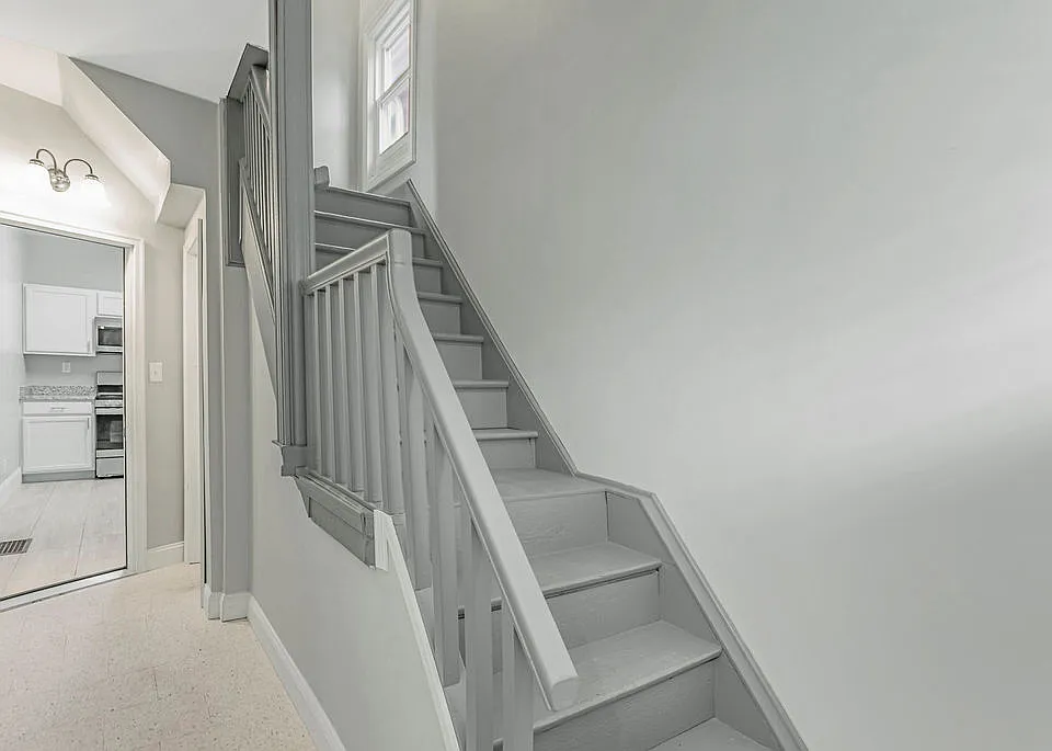 Stairs to the second floor unit