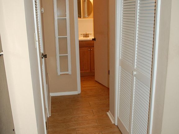 Hallway with lots of closet space