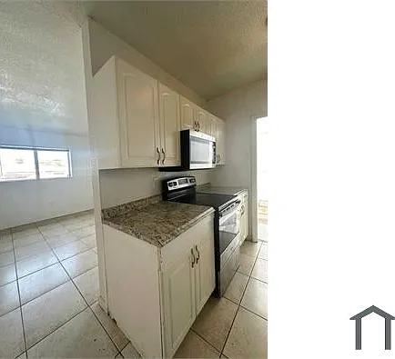 1951 NE 167th St #7 — Photo 1