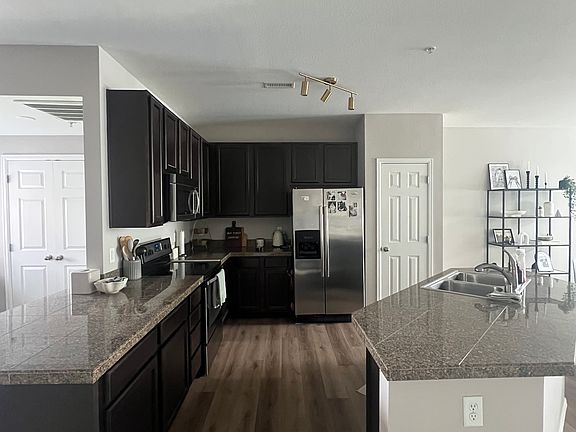 4th image of 9637 E 5th Ave Unit 202
