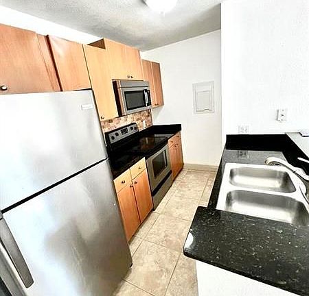 2nd image of 1705 Palm Cove Blvd #1206
