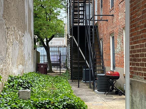 Alley looking from West St to private parking