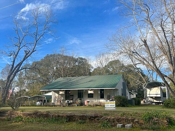Tranquil 8-Acre Homestead with Pond