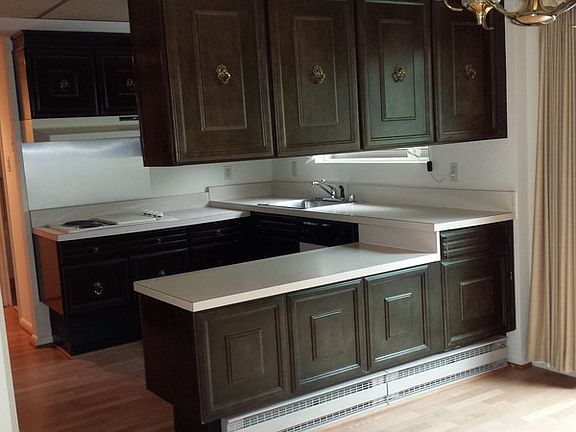 Kitchen from dining room : Easily accessible counters. Fridge, additional counter space & new oven o