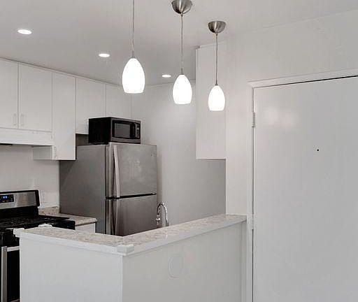 Modern, full kitchen.