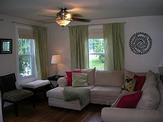 Open and airy living room w/ original hardwood!