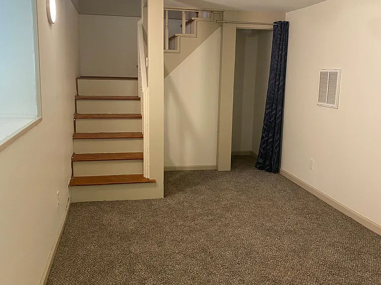 Basement level room_3rd bedroom-office-study-den--stairs now carpeted