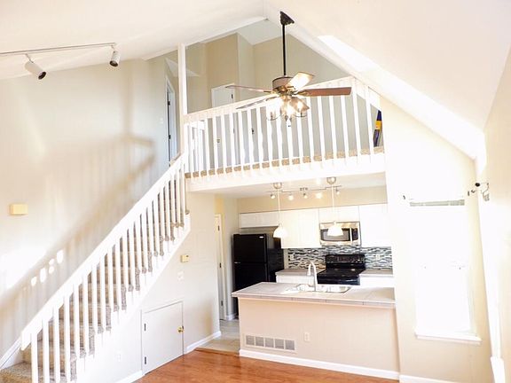 family room with private office. This area has railing replaced with wall