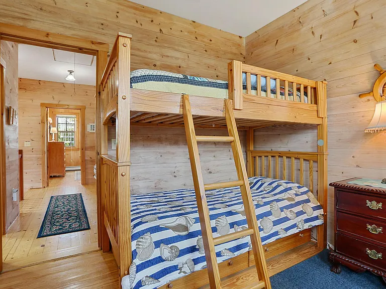 Third upstairs bedroom with a bunk bed and a single, lage walk-in closet