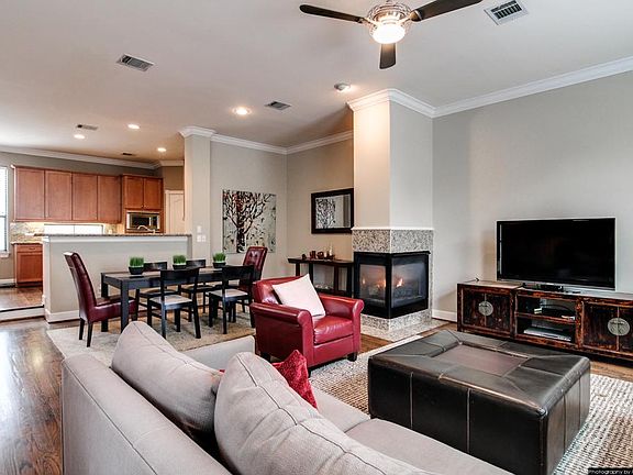 Spacious Secondary Living Space with Wood Flooring
