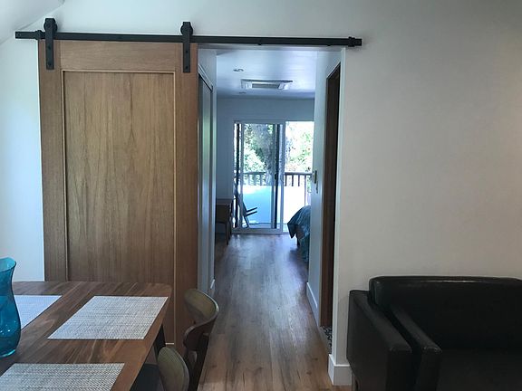 Hallway to the bedroom (Bathroom on the right)