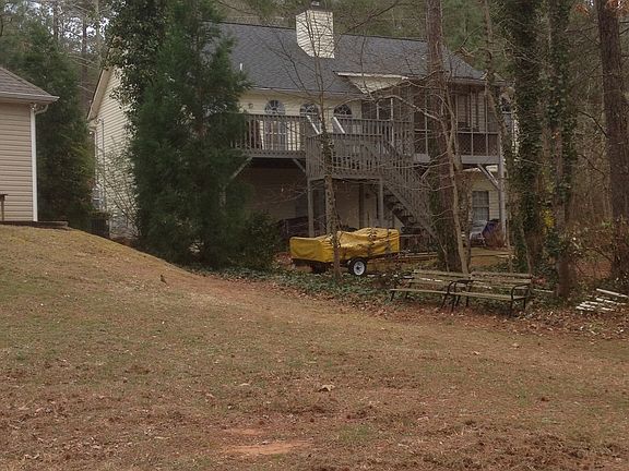 Back of house with screened 