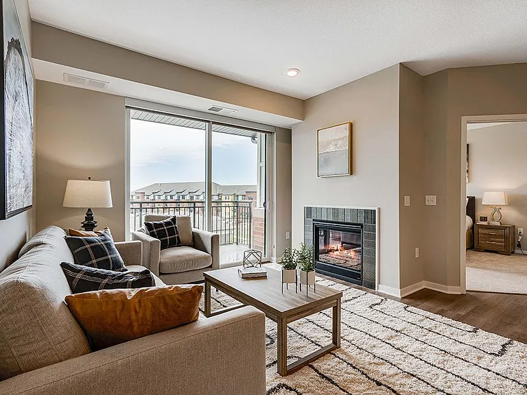 Many homes feature a cozy fireplace in the living room.