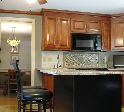 Granite island, wood floors