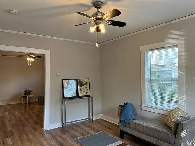 Living space opens into another spacious room that can be used for dining, work space/exercise.