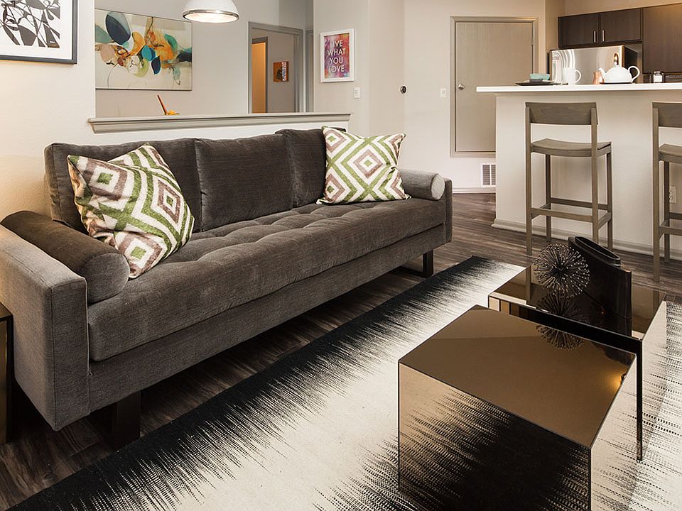 Apartment Living Room with wood floors.