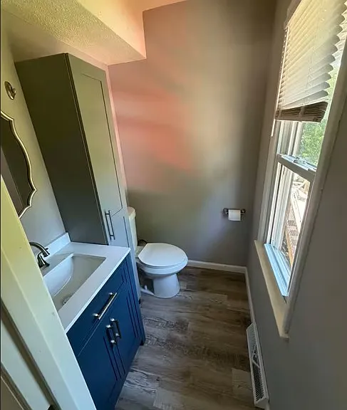 Half bath located in primary bedroom