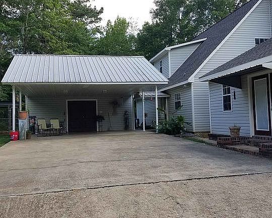 2 bay carport w/storage room