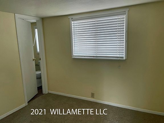 main bedroom adjacent to bathroom
