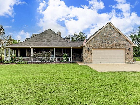 2 car garage with tool storage area and attic space.