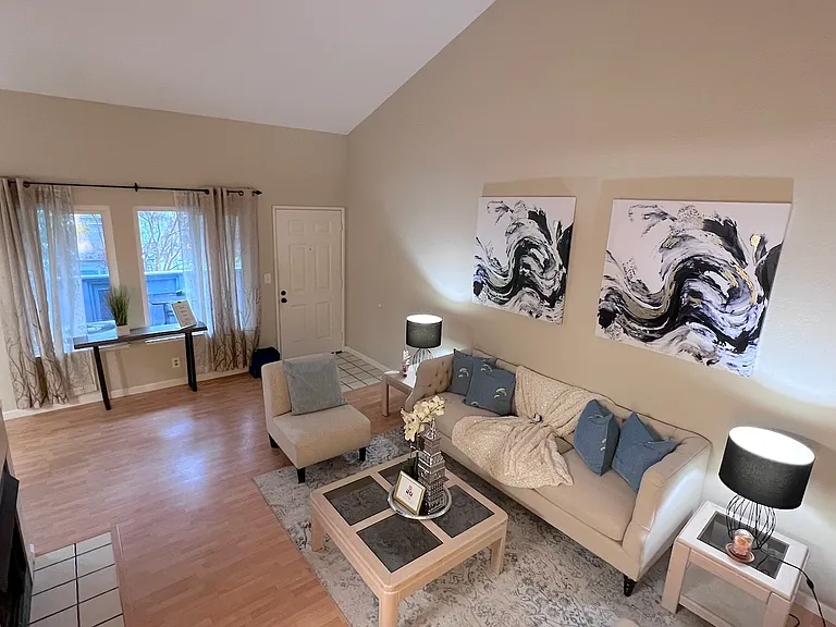 The furnishings shown in the photos are for staging purposes only. Unit is rented unfurnished.