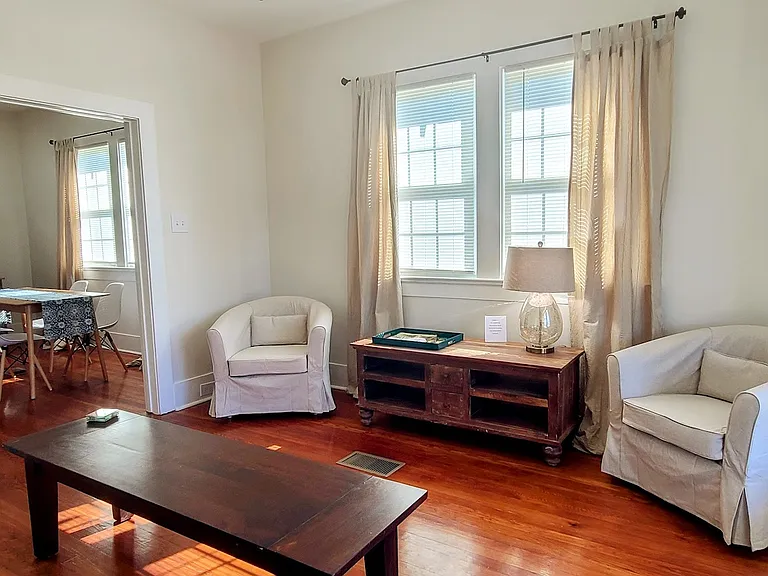 Relaxing living room area with ample seating.