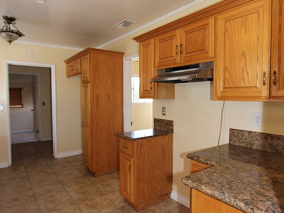 5th image of 5035 N Langham Ave