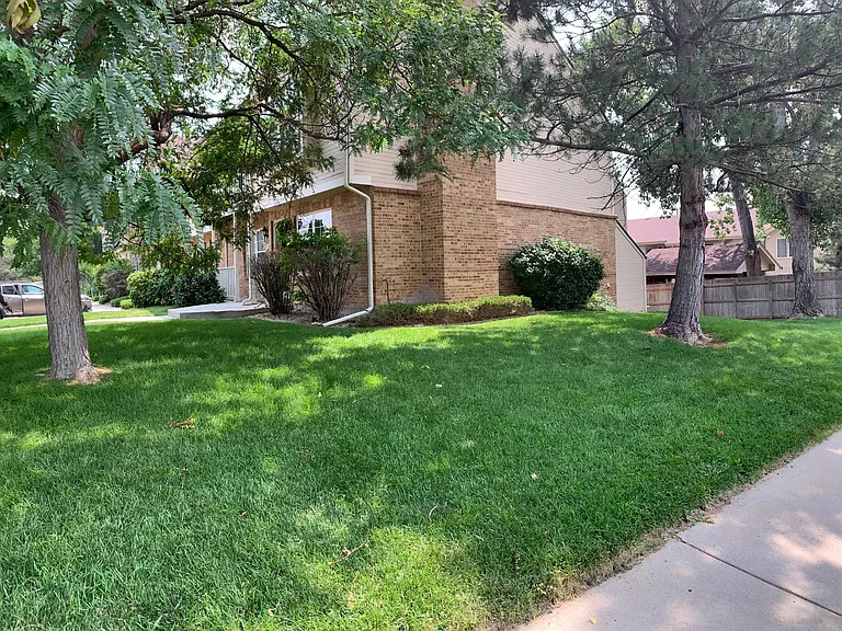 Grass next to unit.