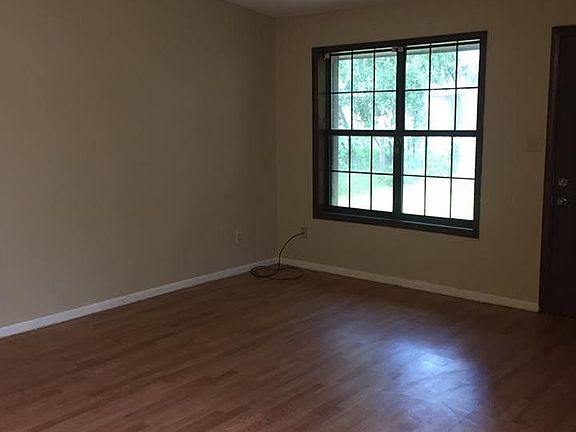 Living room with backdoor & fireplace