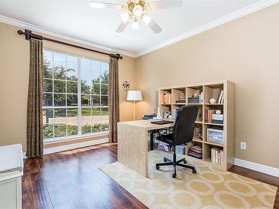 The formal study is located at the front of the house and has a large picturesque window that allows lots of light to come in!