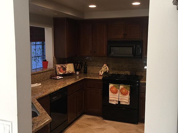 Kitchen has new stainless appliances and abundance of of cabinet storage