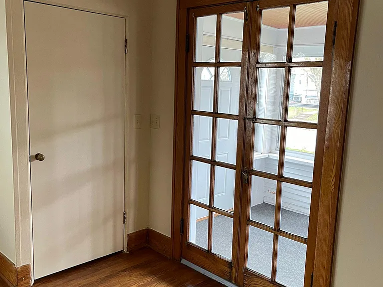 French doors looking out to the front porch.