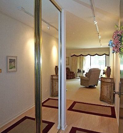 Unit foyer with large guest closet opens to Great Room.