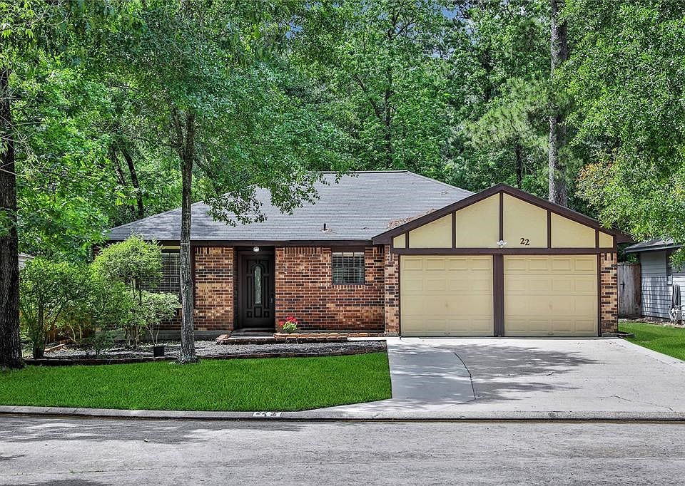 22 Tulip Hill is located on a  very quiet culdesac and has no rear neighbor ! The driveway has been expanded and the garage has a side door access to the backyard! This home is NOT in the 100 yr flood plan nor has water gotten near the property or has owners ever been trapped in the neighborhood so no fears ,  we are high and dry !