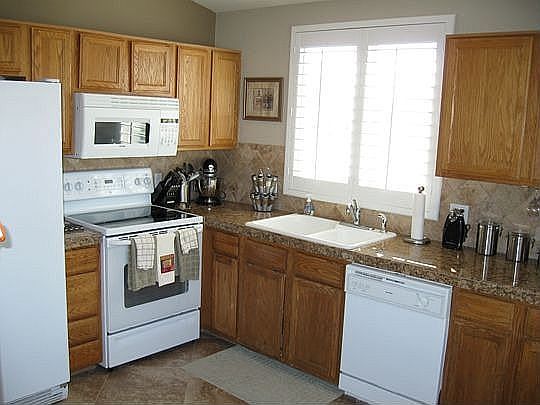 Granite Tile countertops and 18' tile