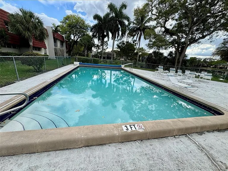 1 Jacaranda Country Club Dr #202 — Photo 15