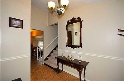 Entry. Bright entry. Fresh paint. New carpet at steps and upper level.