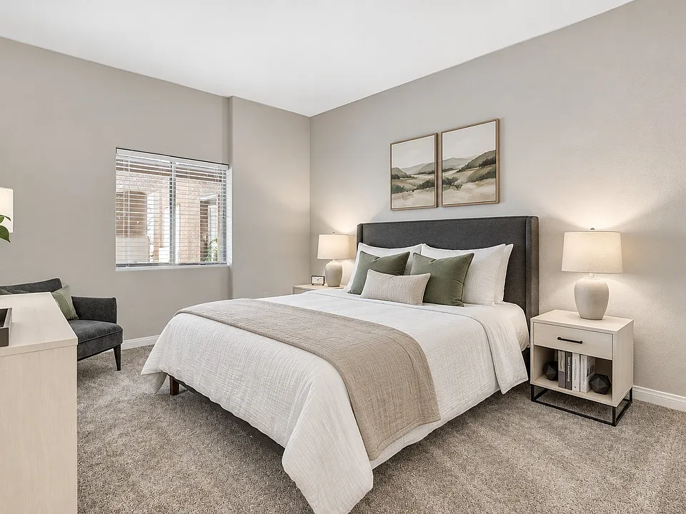 Step into the serene elegance of Eagle Trace with this beautifully designed bedroom, featuring plush furnishings and a calming palette. Perfect for relaxation after a long day. Schedule your tour now and see it for yourself!