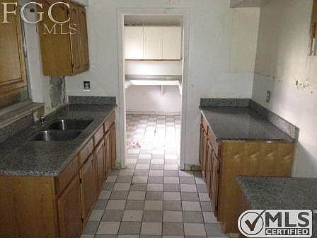 That is Granite Counter Tops!!! Kitchen in great condition.