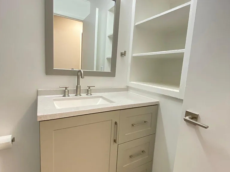 Brand new vanity and sink, mirror, LED light, and plumbing fixtures. Plenty of storage for personal items, toiletries, and towels.