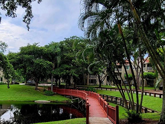 Bridge to pool and fitness center, view from covered patio