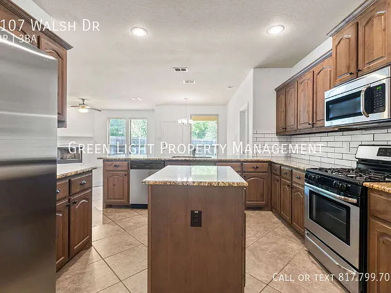 5107 Walsh Dr — Photo 7