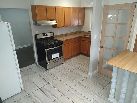 Kitchen with room for small table. Appliances included.