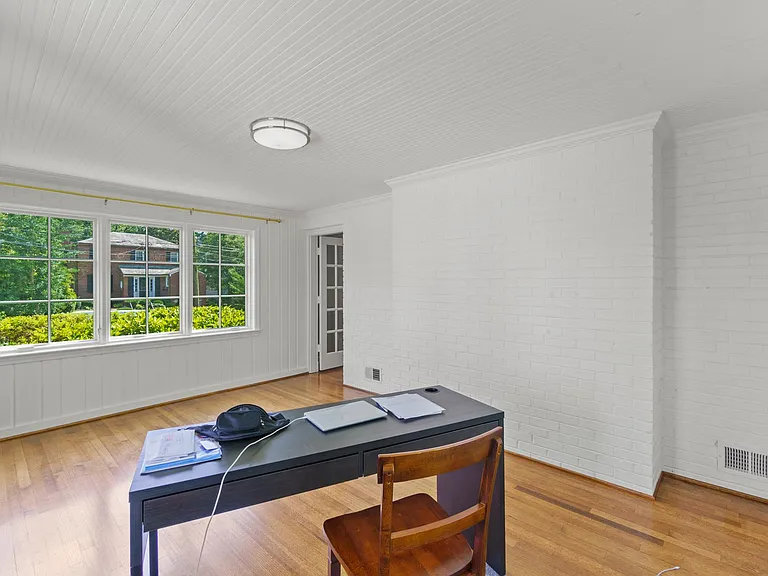 Light-filled sunroom for home office or playroom